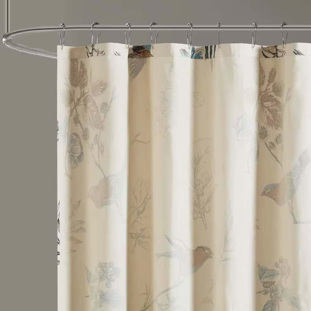 Shower curtain with floral and bird pattern on a gray background