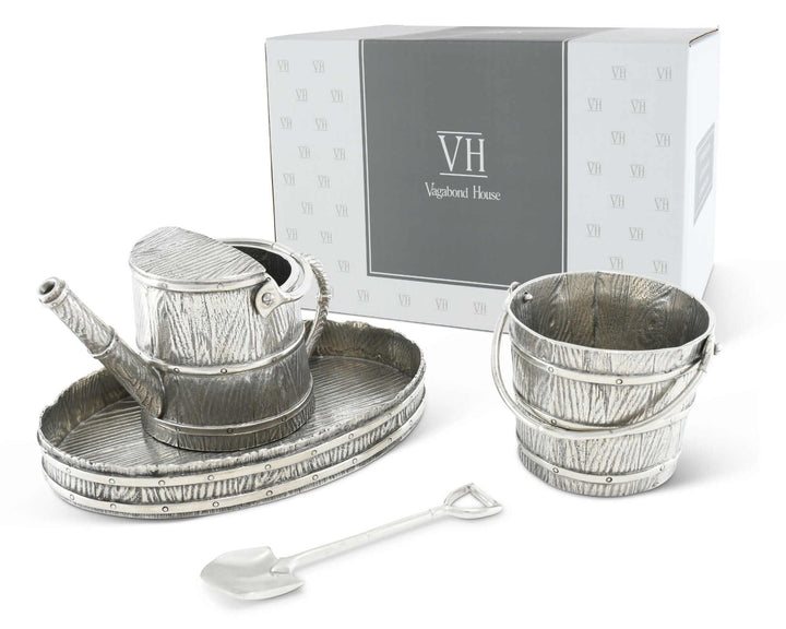 Metallic creamer set with watering can, bucket, and tray in front of a Vagabond House branded box.