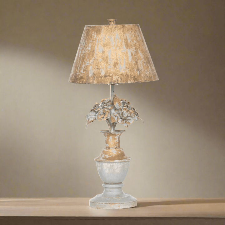 Decorative table lamp with a textured shade on a neutral background