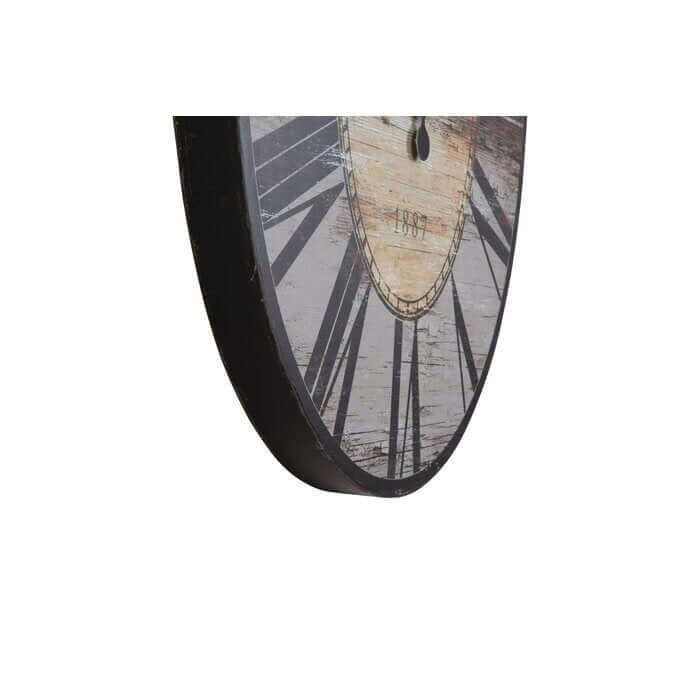 Decorative wall clock with abstract design on a white background