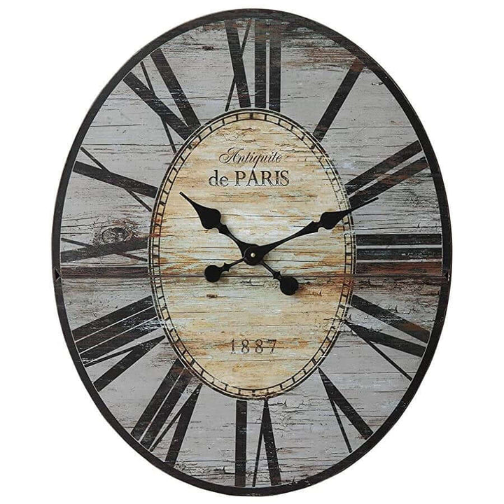 Decorative wall clock with rustic design and 'Antiquite de Paris' text on a white background