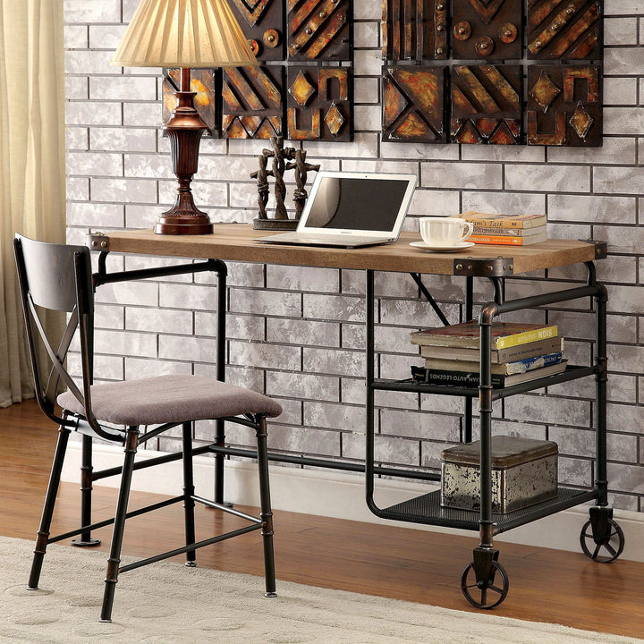 Wooden desk with metal legs and shelves against a brick wall.