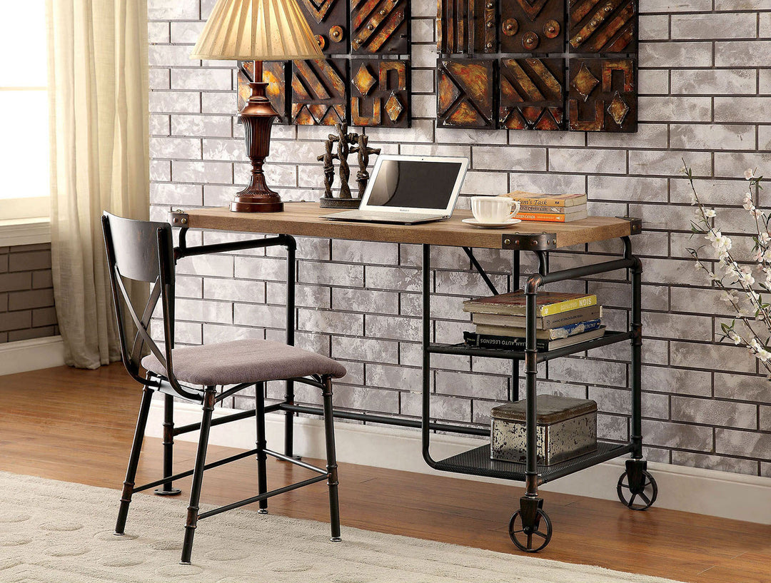 Wooden desk with metal frame and wheels against a brick wall.