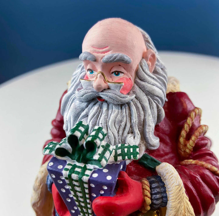 Vintage Santa Figurine with Gifts and Bells by Department 56