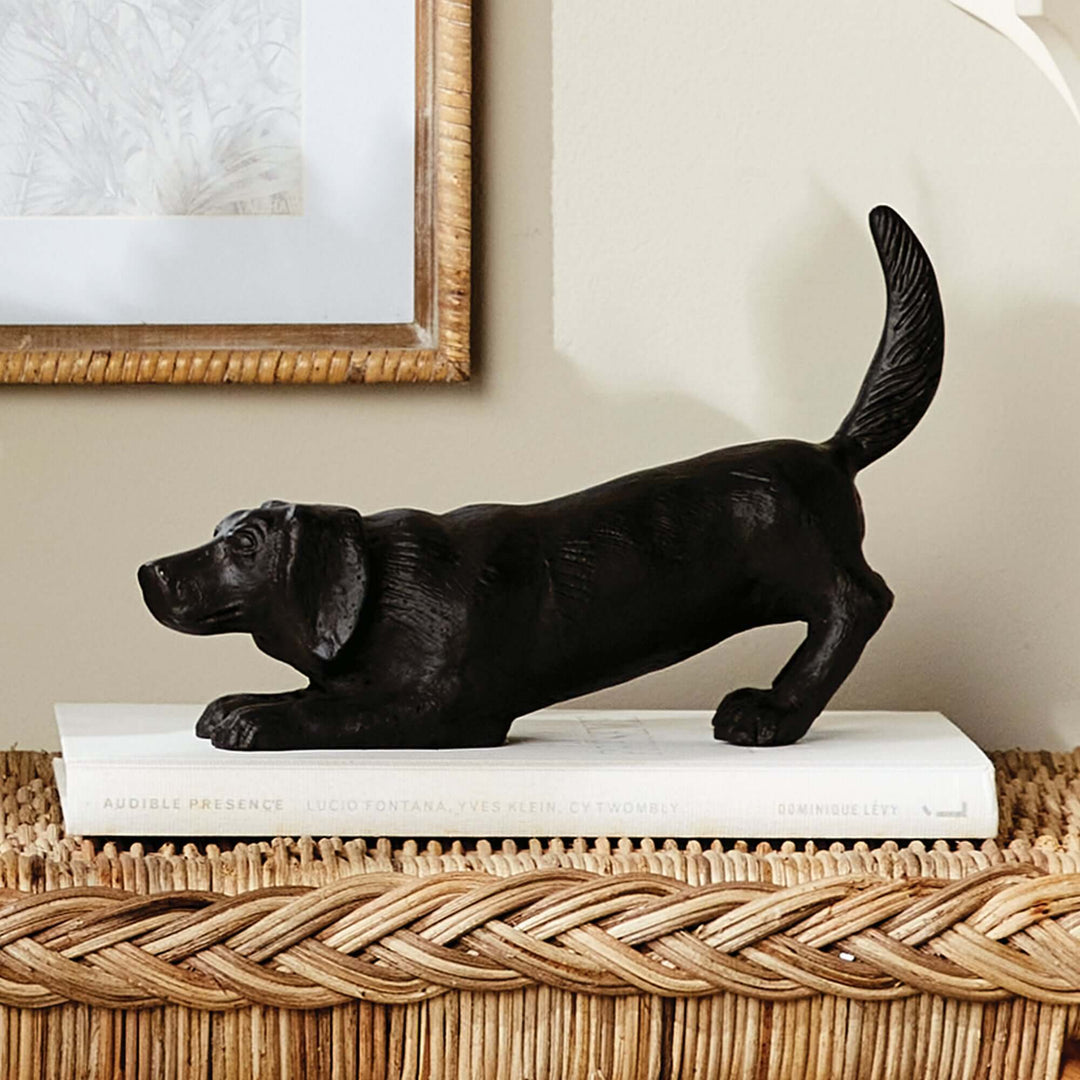 Vintage Metal Playful Dog Sculpture on book