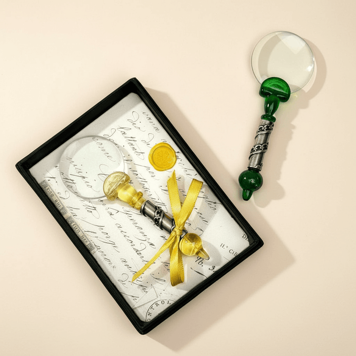 Decorative magnifying glasses on a beige background