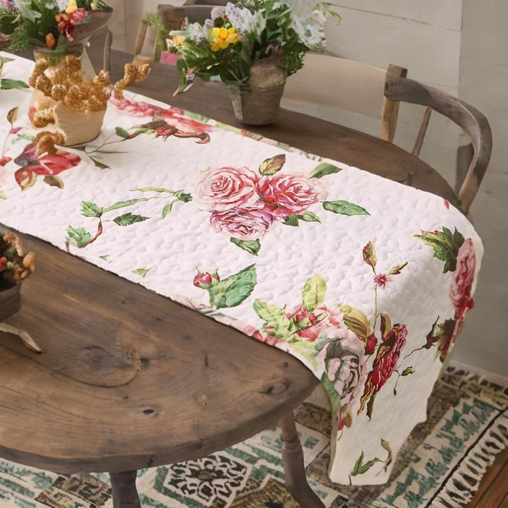 DaDa Bedding Romantic Roses Pink White Lovely Floral Quilted Dining Table Runner (879) on a wooden table with flowers
