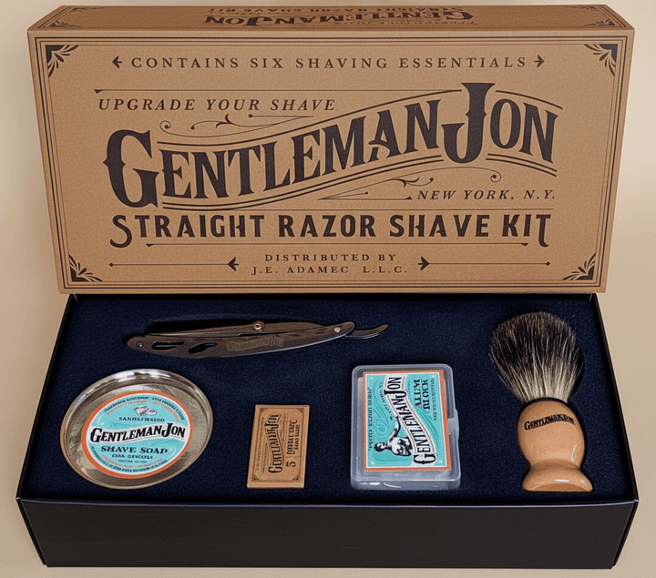 Gentleman Jon straight razor shave kit with box on a beige background