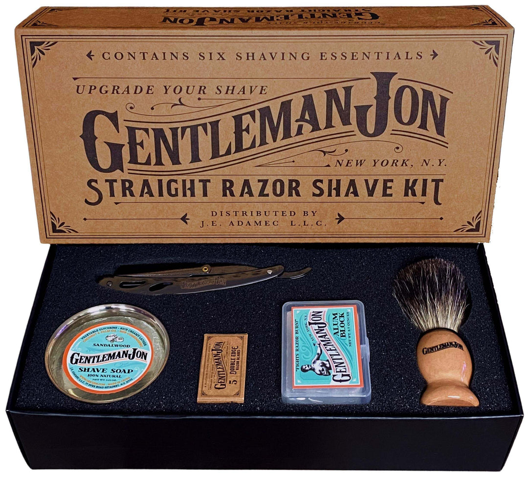 Gentleman Jon straight razor shave kit with various shaving essentials in a box.