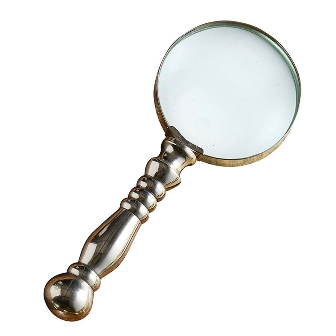 Handheld magnifying glass with decorative handle on a white background