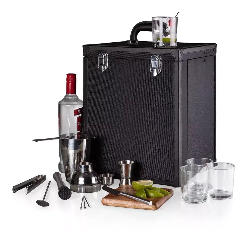 Black portable bar kit with cocktail-making tools and ingredients on a white background