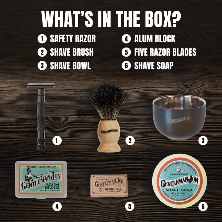 Barber shop set with safety razor, brush, bowl, alum block, razor blades, and soap on a wooden background.