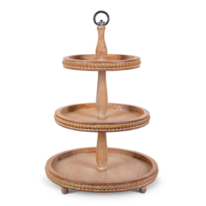 Three-tiered wooden serving tray on a white background