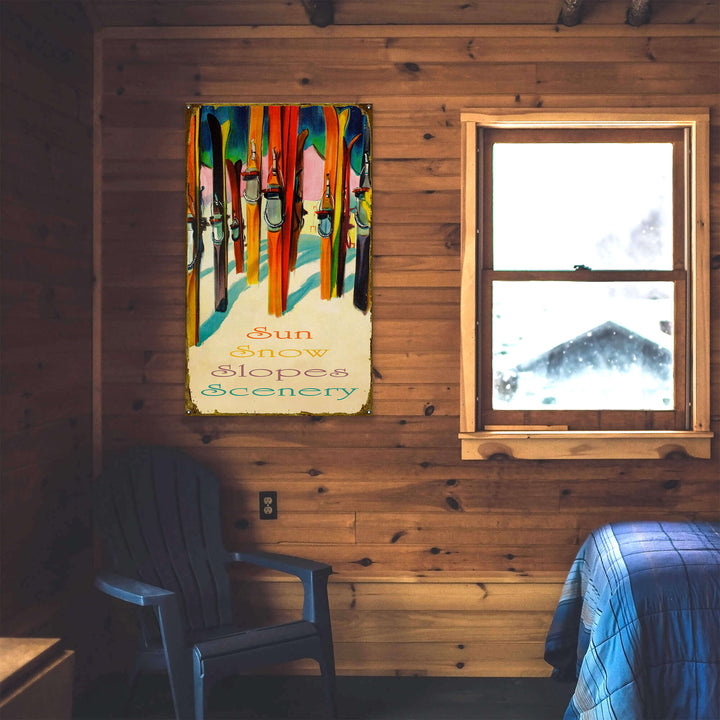 Wooden cabin interior with a poster of skis and a window showing a snowy landscape.