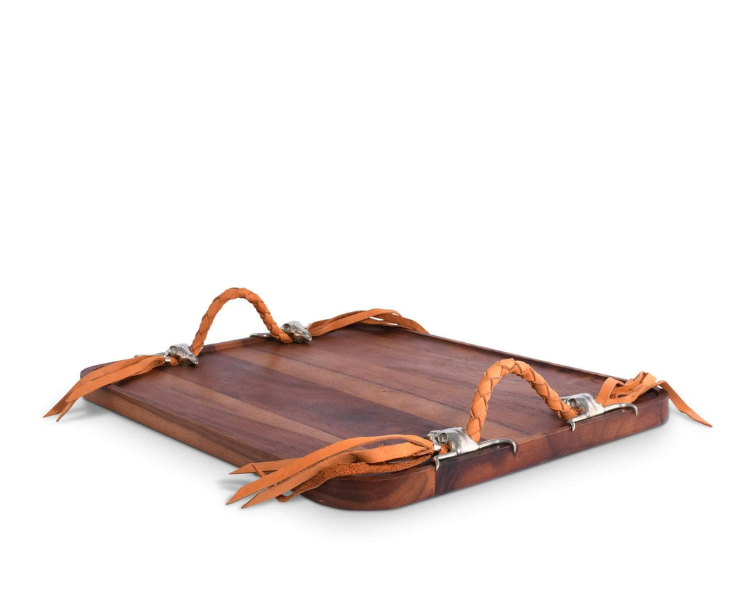 Wooden tray with orange leather handles on a white background