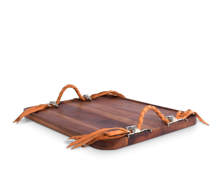 Wooden tray with orange leather handles on a white background