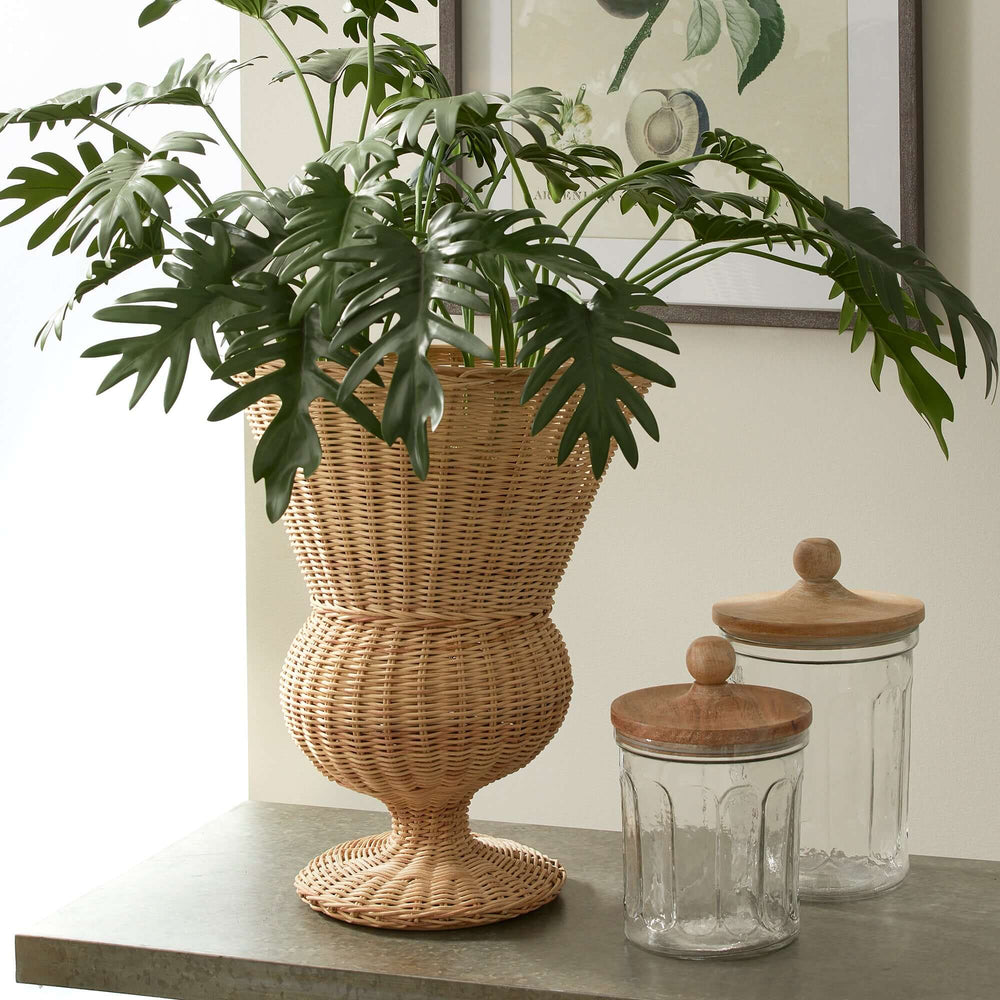 Wicker Urn-Shaped Decorative Vase with plant in it 