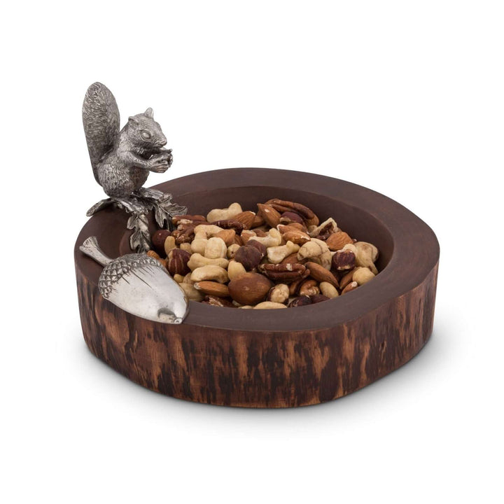 Decorative bowl with a wooden base and metal squirrel figures on a white background