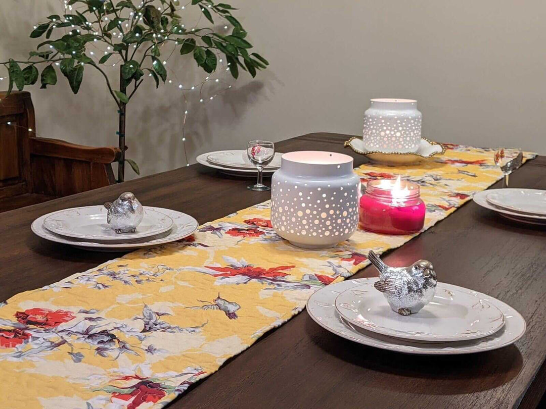 Yellow Floral Vintage Hummingbirds Garden Table Runner (925) on a decorated dining table with candles.