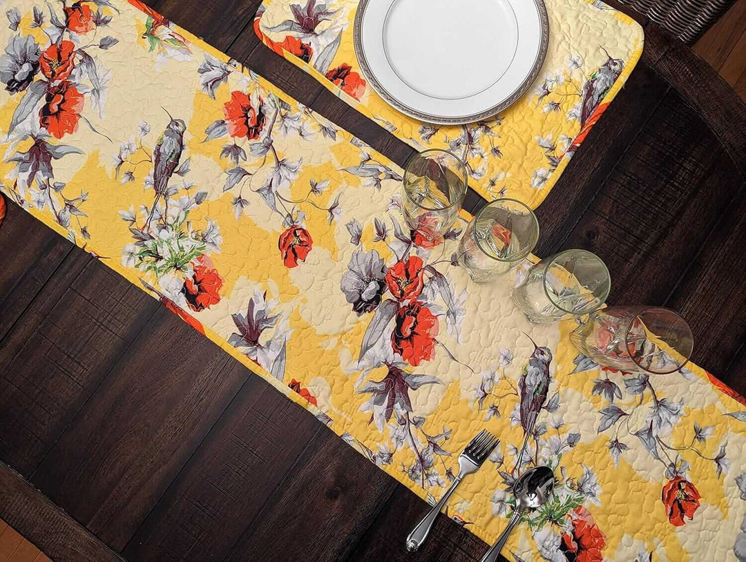 Yellow Floral Vintage Hummingbirds Garden Table Runner (925) displayed on a wooden dining table.