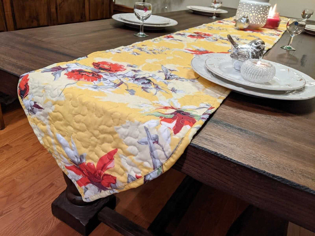 Sunshine Yellow Floral Vintage Hummingbirds Garden Table Runner (925) on a dining table with floral design