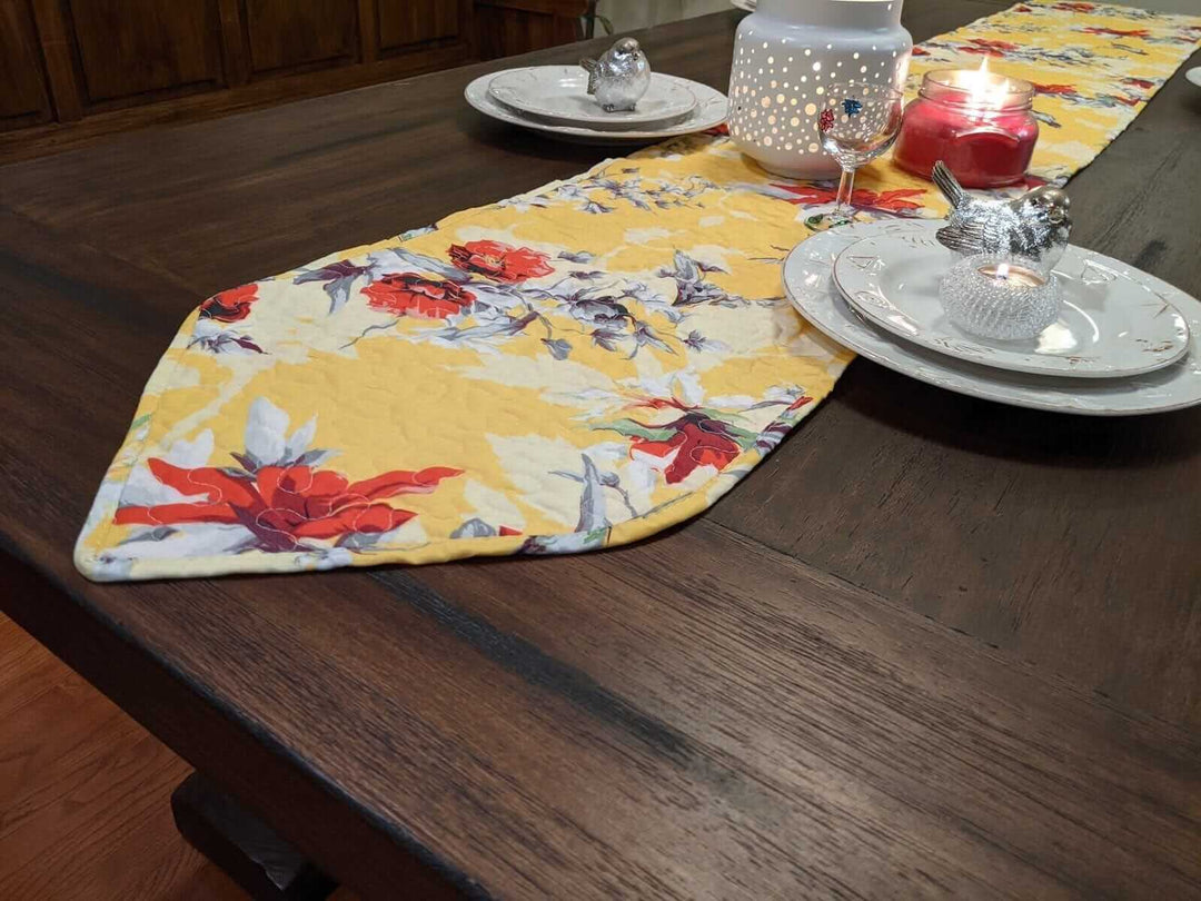 Yellow Floral Vintage Hummingbirds Garden Table Runner (925) with floral and hummingbird pattern on table.