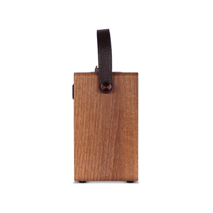 Wooden rectangular speaker with a strap on a white background