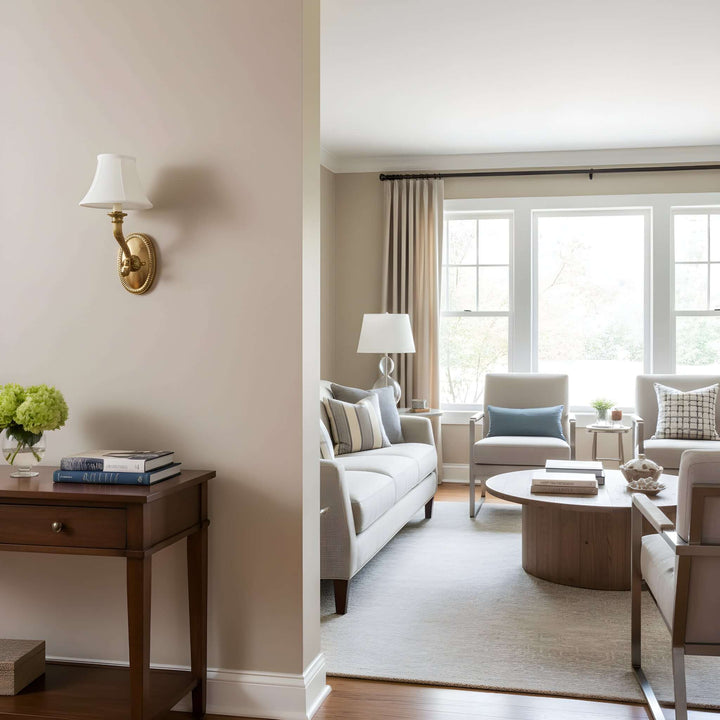 Elegant living room with Antique Brass Wall Sconce with Fabric Shade and modern decor in natural light.