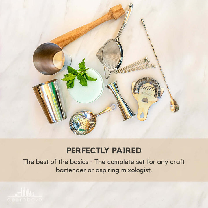 Antique Copper Mixologist Bartender Set (14-Piece) displayed on marble surface, ideal for cocktail crafting and bartending.