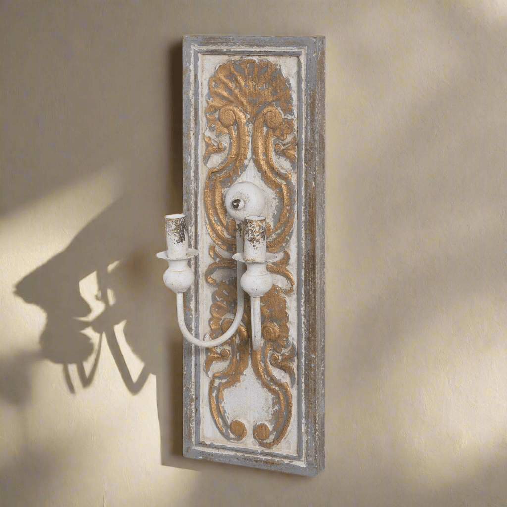 Antique French Country Wall Sconce Light with ornate gold and white distressed finish on carved wooden backplate.