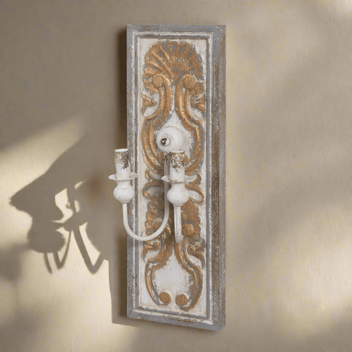 Antique French Country Wall Sconce Light with ornate gold and white distressed finish on carved wooden backplate.