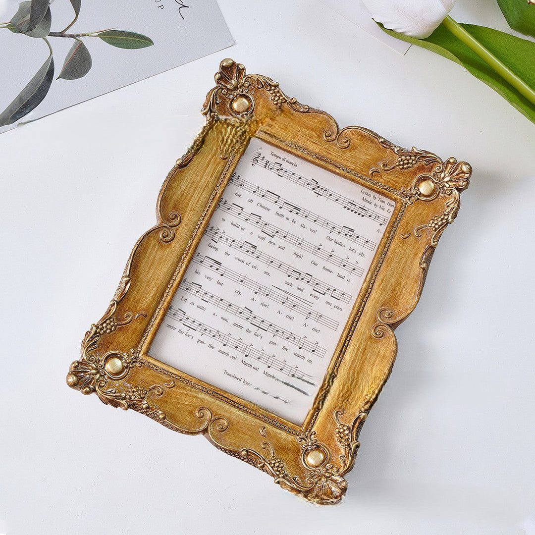 Small Antique Gold Scrollwork Picture Frame viewed from above