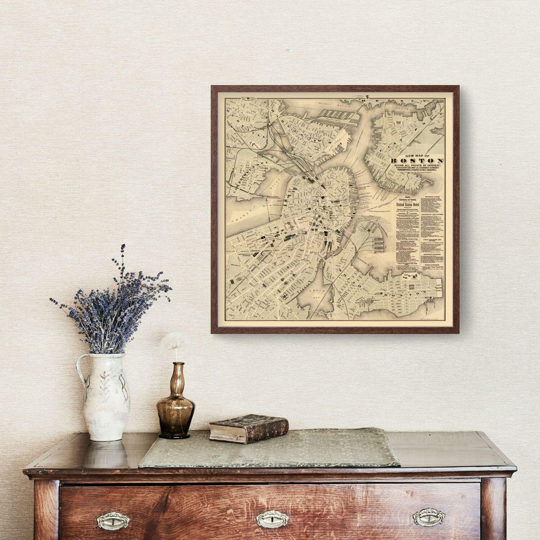 Antique Map of Boston, Massachusetts from 1884 displayed above a vintage sideboard with decor items.