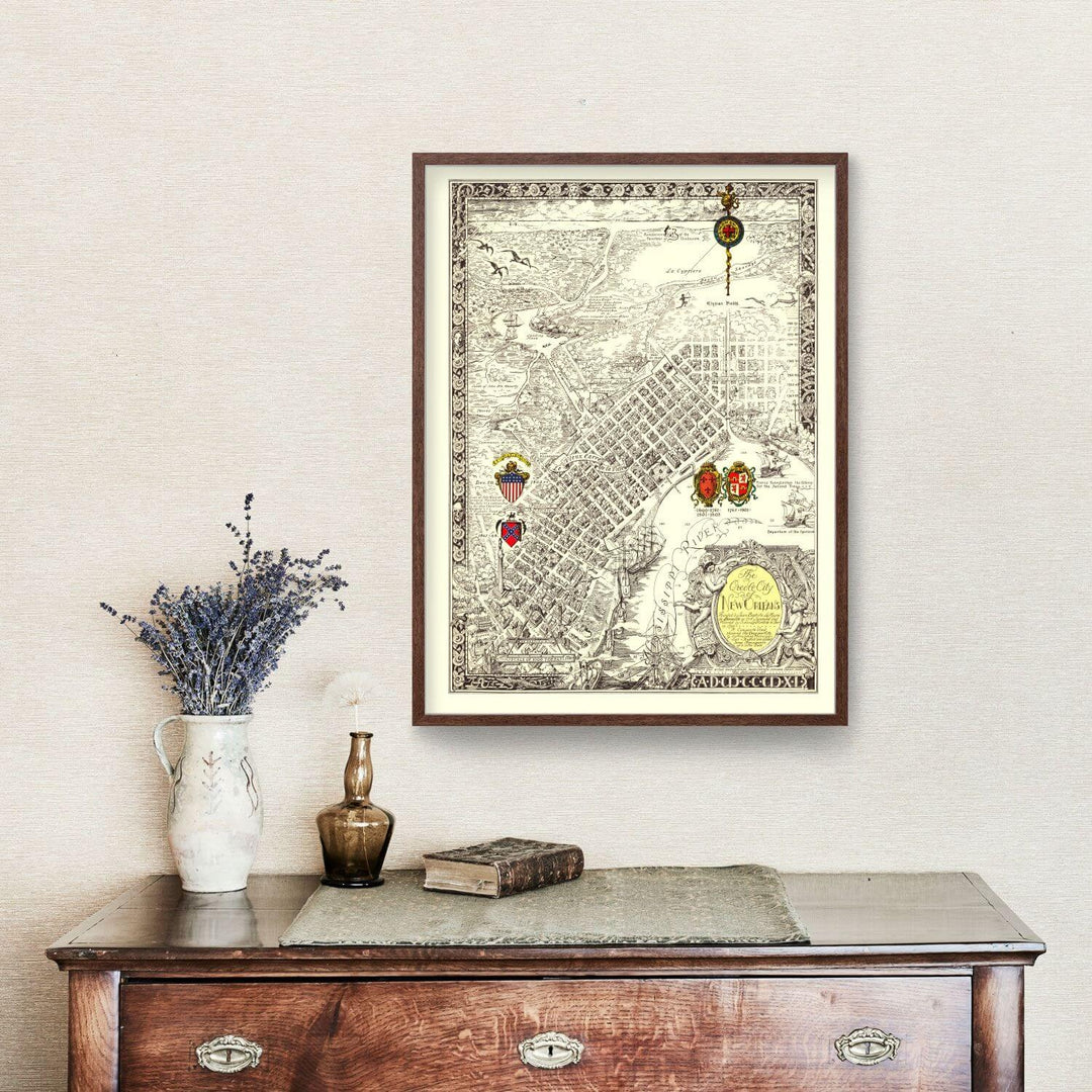 Antique Map of New Orleans, Louisiana from 1930 displayed above a wooden dresser, showcasing intricate Art Deco design elements.