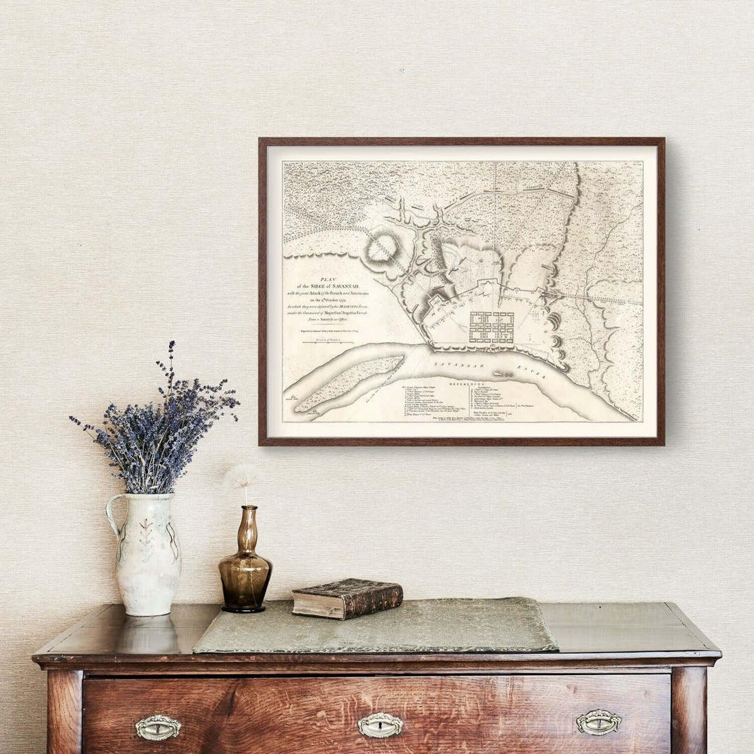 Antique Map of Savannah, Georgia from 1794 displayed above a wooden table with decor.