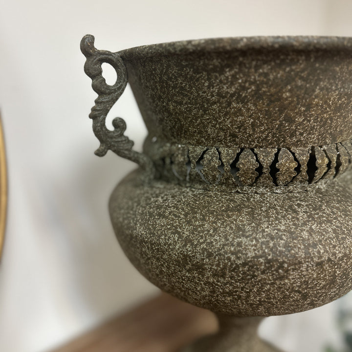 Detail of the textured antique rust finish and ornamental handle