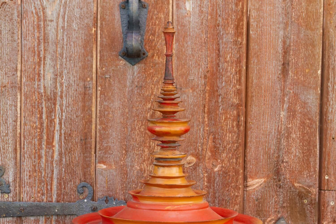 Antique Shan-Style Burmese Temple Vessel with classic stupa-inspired design, showcasing 19th-century craftsmanship against a rustic backdrop.