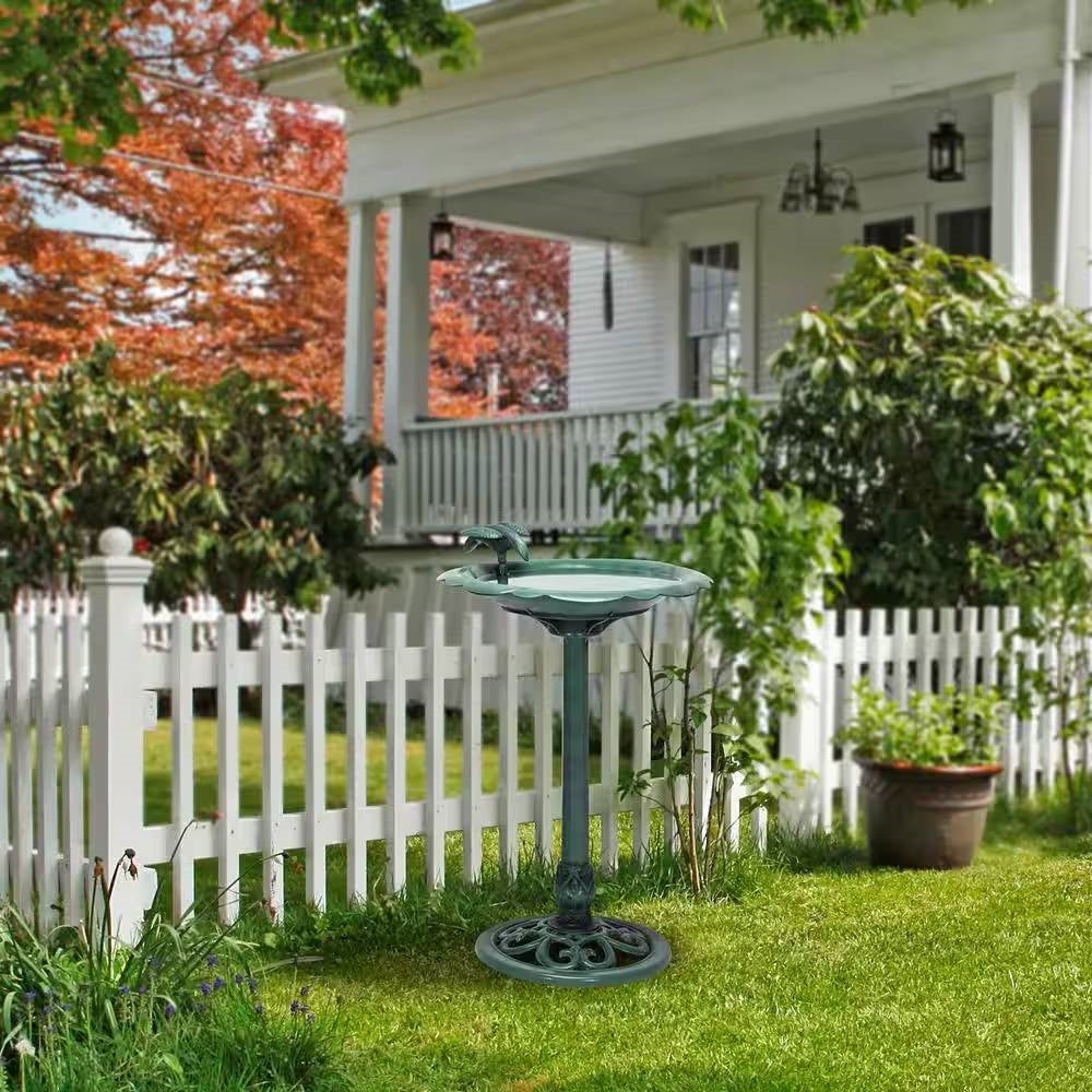 Antique Style Dark Green Bird Bath in a lush garden setting enhancing a vintage aesthetic