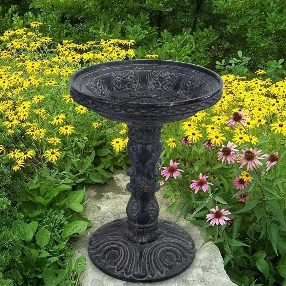 Antique-Style Garden Bird Bath with weathered stone finish in a colorful garden setting.