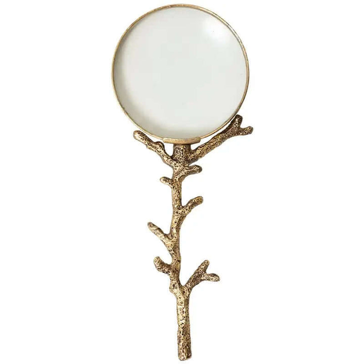 Antique-style gold branch magnifying glass with nature-inspired handle and distressed finish.