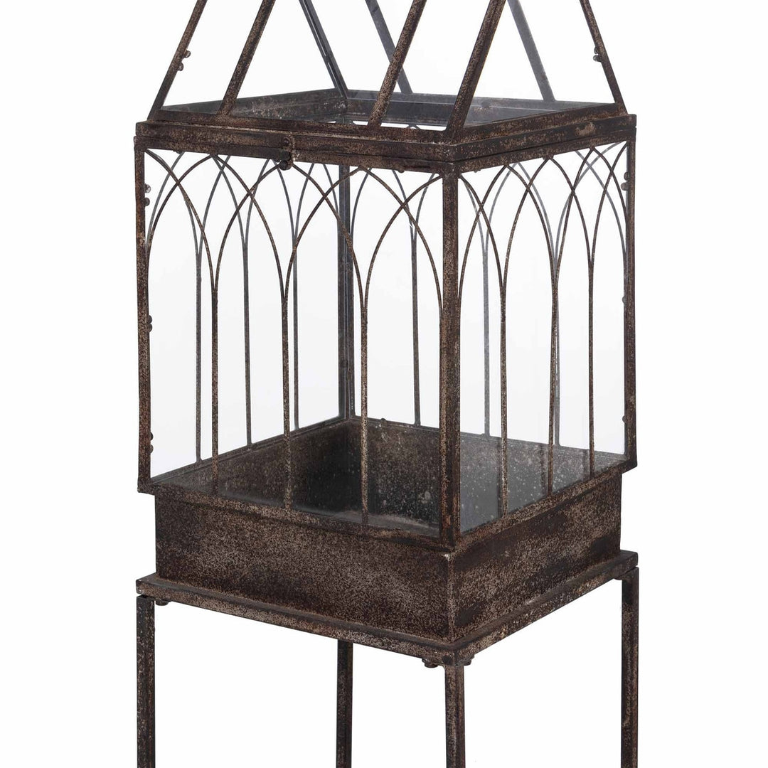 Antique Black Iron Standing Garden Terrarium with Gothic Arch Detail showcasing intricate design and elegant craftsmanship.