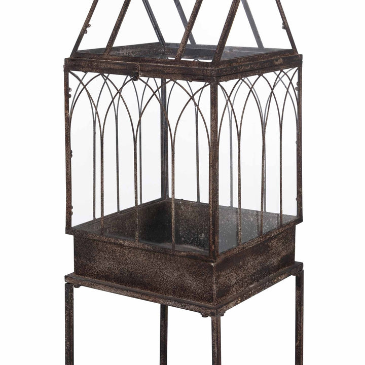 Antique Black Iron Standing Garden Terrarium with Gothic Arch Detail showcasing intricate design and elegant craftsmanship.