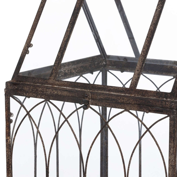 Antique Black Iron Standing Garden Terrarium with Gothic Arch Detail, showcasing rustic elegance and intricate design.