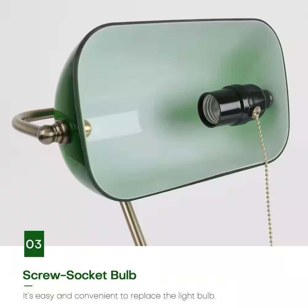 Close-up of the Antique Brass Bankers Lamp with Green Glass Shade showcasing the screw-socket bulb design.