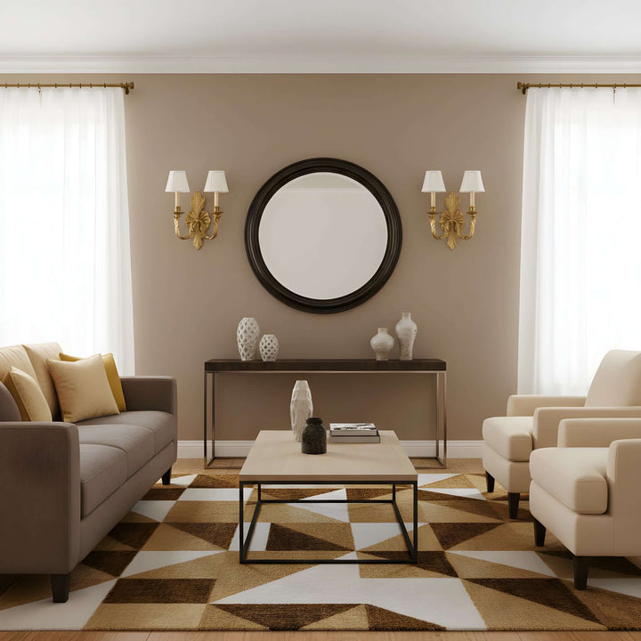 Antique Brass Double Arm Sconce with Pleated Shades in elegant living room setting with neutral decor and geometric rug.