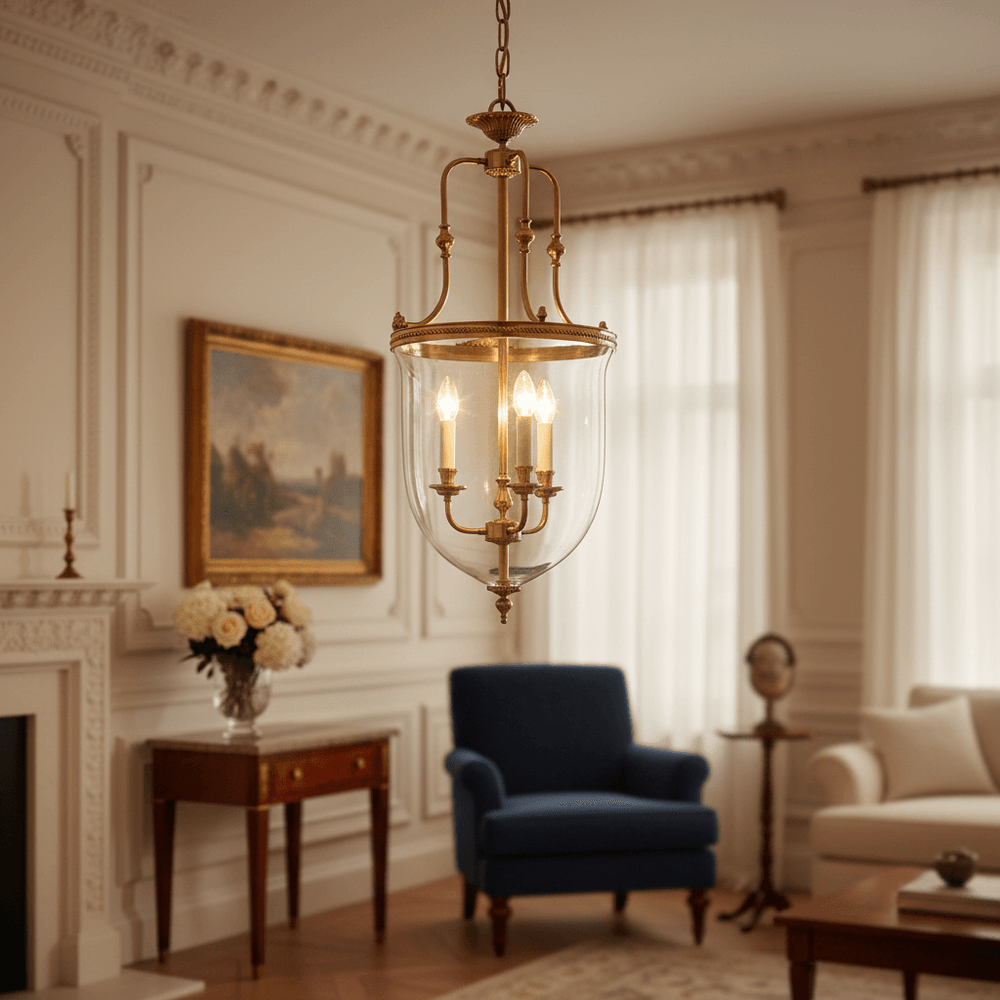 Luxurious living room with a chandelier, blue armchair, and white sofa.