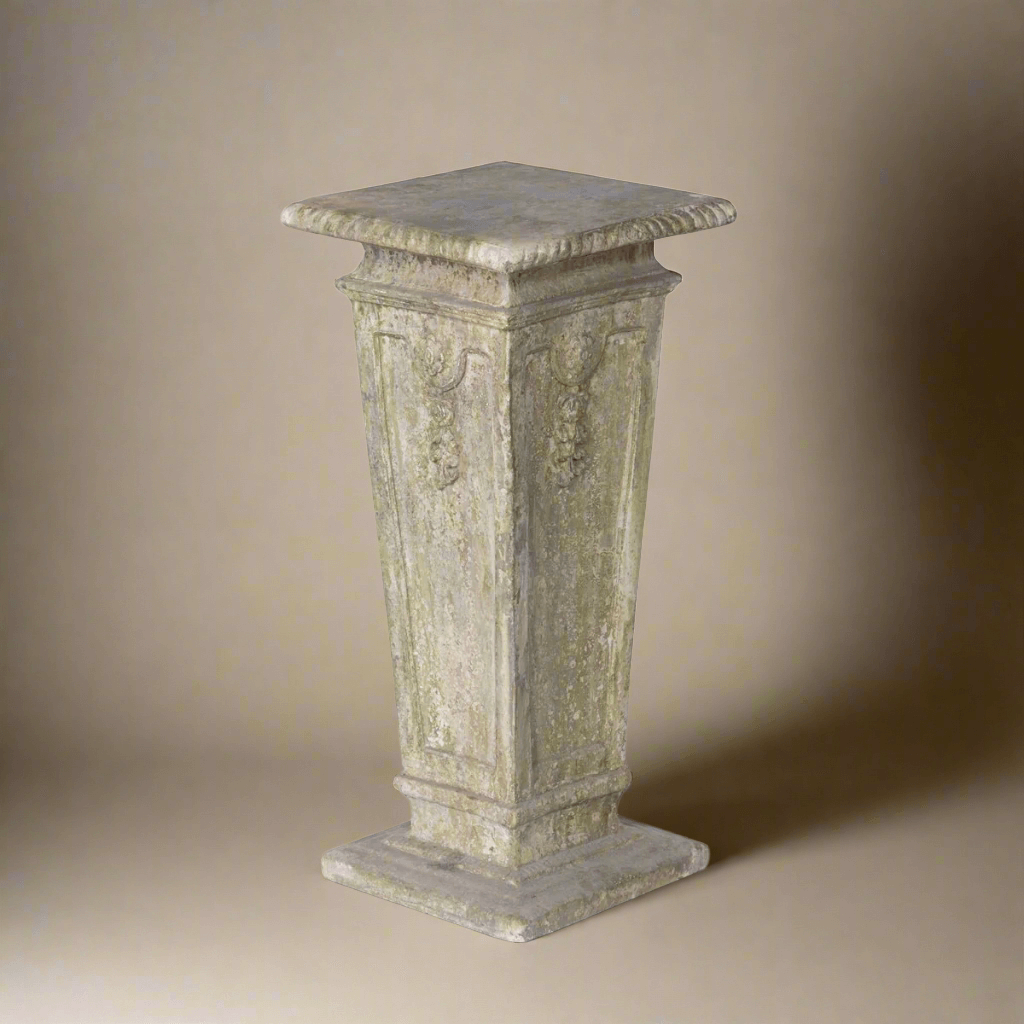 Antique European square garden pedestal with ornate relief details, ideal for displaying floral arrangements or sculptures.