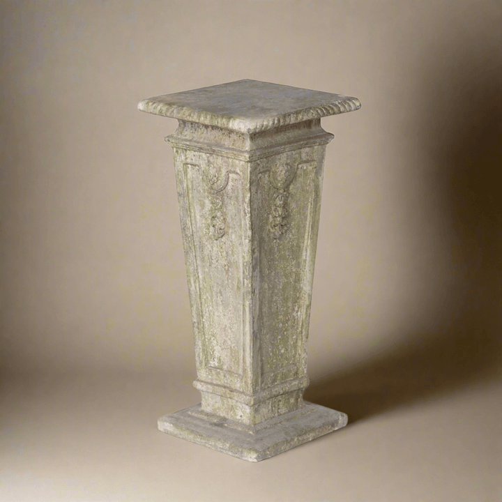 Antique European square garden pedestal with ornate relief details, ideal for displaying floral arrangements or sculptures.