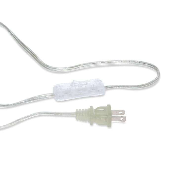 Clear electrical plug with on-off switch and silver wire for wall sconce.