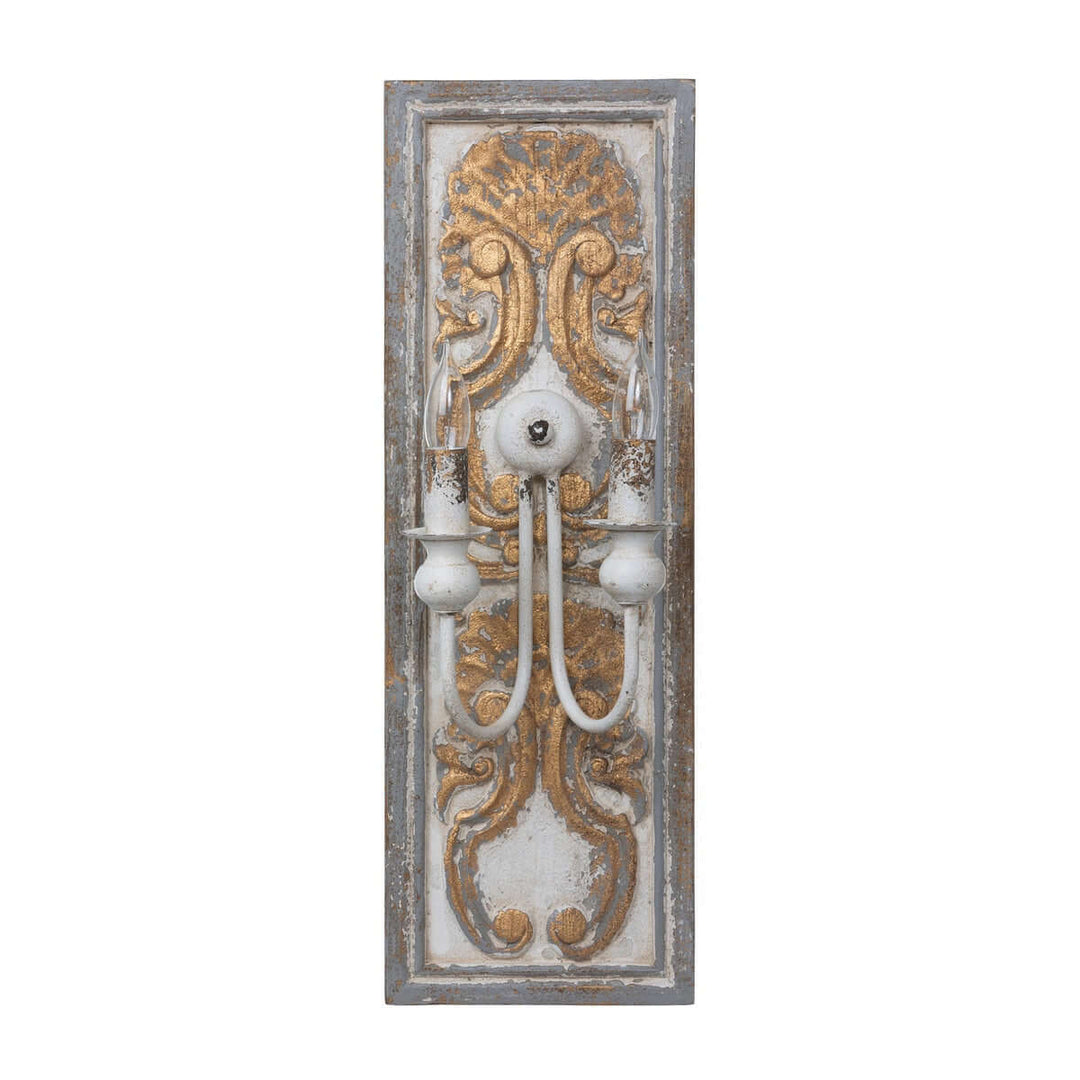 Antique French country wall sconce with carved wooden backplate and distressed gold finish, evoking rustic elegance and historical charm.